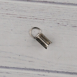 METAL ÇANTA KÖŞESİ 4-3 CM. GUMUS